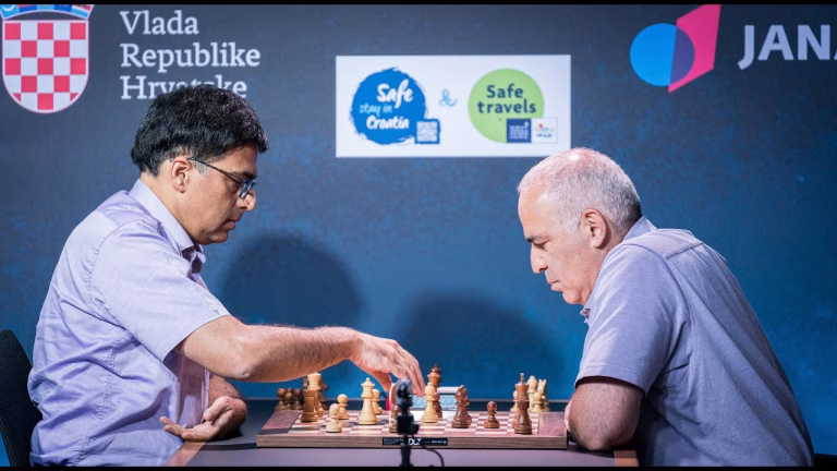 Vishy Anand y Garry Kasparov